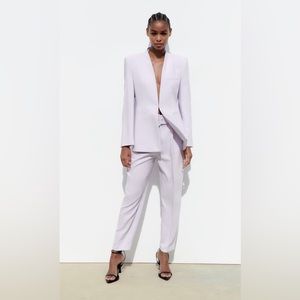 Lilac pants with fabric covered belt